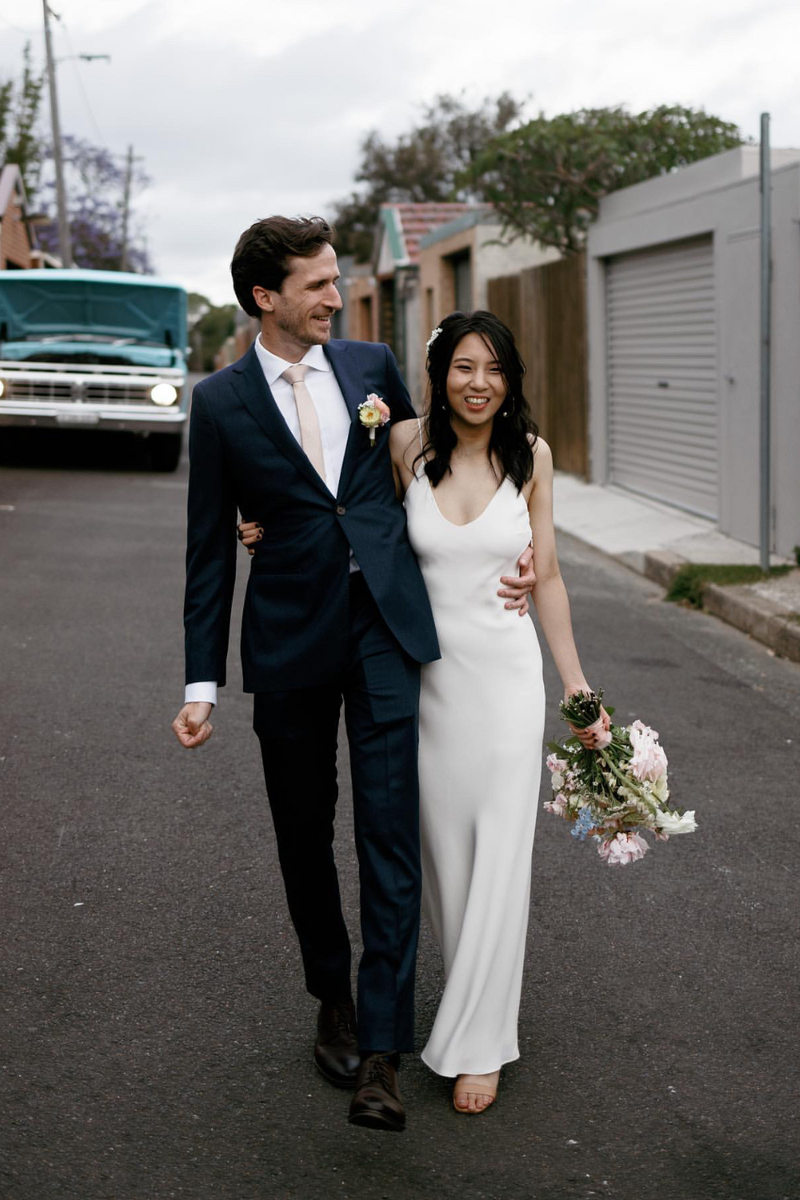 white slip wedding dress Cosmos gown This classic silhouette is paired with a complimentary freshwater pearl neckpiece that can be worn in a variety of ways for ample impact LITTLE WHITE SLIP DRESS